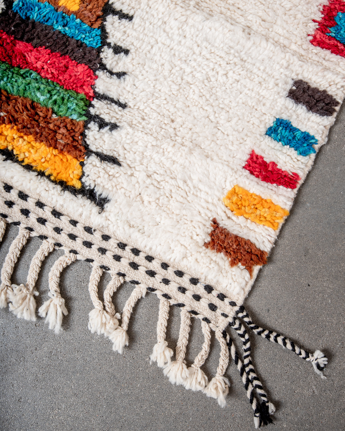 Modern, designer, handcrafted Berber rug from Morocco. Beniourain carpet with beautiful colours and patterns and fluffy wool texture.